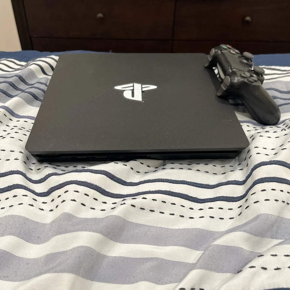 PS4 system with controller and 1 game